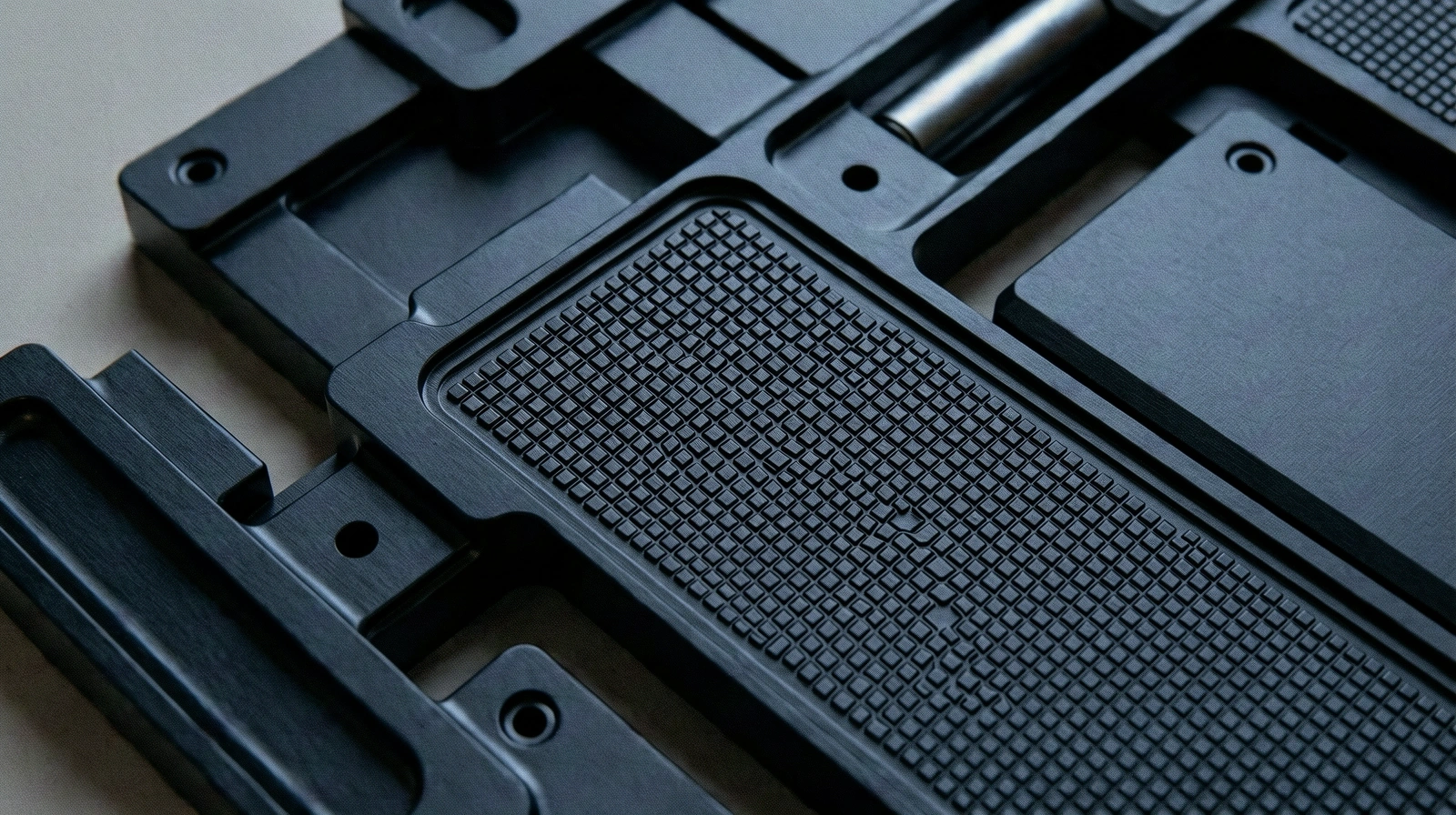 Textured black metal surface